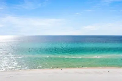 a view of the ocean with people on the beach at Majestic Beach Towers 1-1803 in Panama City Beach