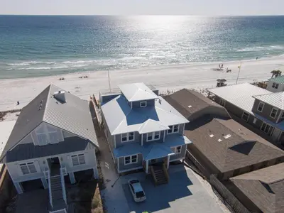 an aerial view of a house and the beach at Making Waves - Huge Heated Beachfront Pool & Hot Tub! Best In Pcb! in Panama City Beach