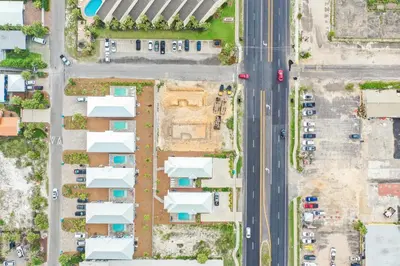 an overhead view of a parking lot with cars at Hook, Wine & Sinker - Private Pool! Brand New! in Panama City Beach