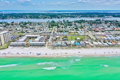 an aerial view of a beach and buildings at Beachcomber - Beachfront With Pool And Hot Tub - On The Beach! in Panama City Beach