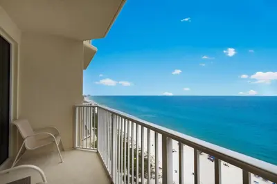 a balcony with a view of the ocean at Boardwalk 1405 in Panama City Beach