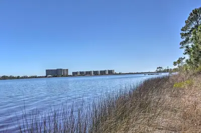 a view of a lake with buildings in the background at Pinnacle Port Getaway with Ocean View and Pool Access! in Panama City