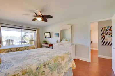 a bedroom with two beds and a ceiling fan at Nautical Edgewater Resort Condo - Walk to Beaches! in Panama City Beach