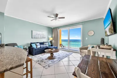 a living room with a view of the ocean at Splash 303E in Panama City Beach