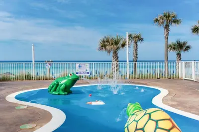 a water park with two turtles in a pool at Splash 303E in Panama City Beach