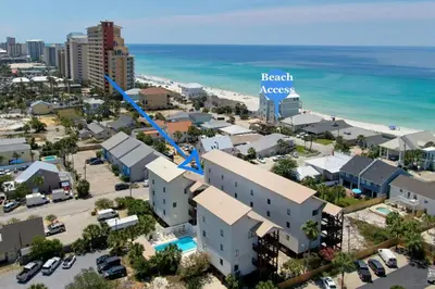an aerial view of the beach access apartments and the ocean at Sandcastle Villas #24 in Panama City Beach
