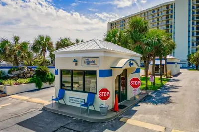 a small gas station with two stop signs at Commodore 107 (2/2) in Panama City Beach