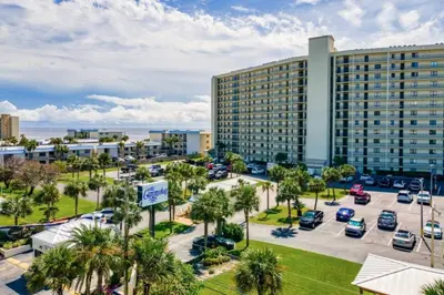 an aerial view of a parking lot in front of a large building at Commodore 107 (2/2) in Panama City Beach