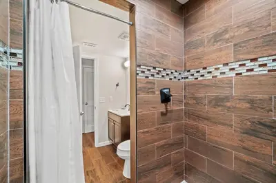 a bathroom with a toilet and a shower at 5218 Beach Dr A in Panama City Beach
