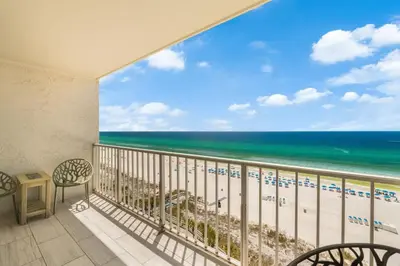 a balcony with a view of the beach at The Summit 1107 in Panama City Beach