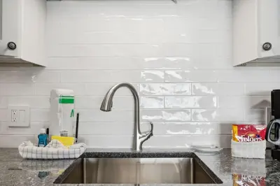 a kitchen counter with a sink in a kitchen at The Summit 602 in Panama City Beach