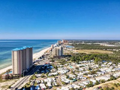 an aerial view of a resort and the ocean at Brightly Furnished Beachfront Condo by Brightwild- 7th Floor Gulf View! in Panama City Beach