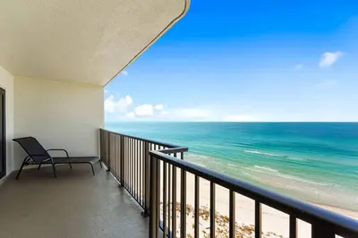 a balcony with a view of the ocean at Commodore 903 (2/2) in Panama City Beach