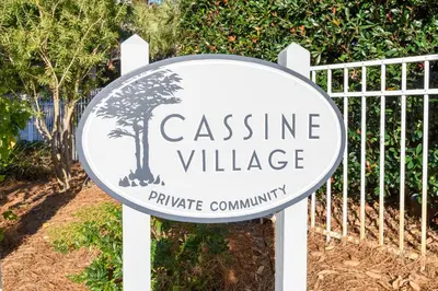 a sign for a casine village private community at Cassine Dream in Santa Rosa Beach