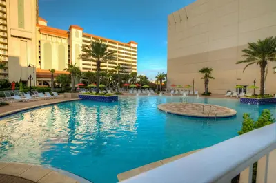 a large swimming pool in the middle of a resort at BRAND NEW!Laketown Wharf 334! Beautiful 3 BD, Great Amenities, And Great Location in Panama City Beach