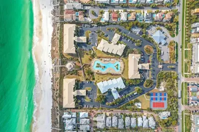 an aerial view of a resort complex next to the beach at High Pointe Resort 414 in Rosemary Beach