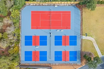 an overhead view of a parking lot with red and blue squares at High Pointe Resort 414 in Rosemary Beach