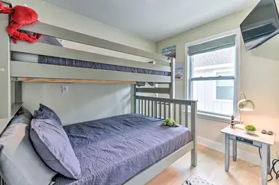 a bedroom with two bunk beds and a window at Half Mi to Inlet Beach Home with Grill and Fire Pit in Inlet Beach