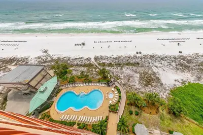 an aerial view of the beach at the resort at Hidden Dunes 1303 in Panama City Beach