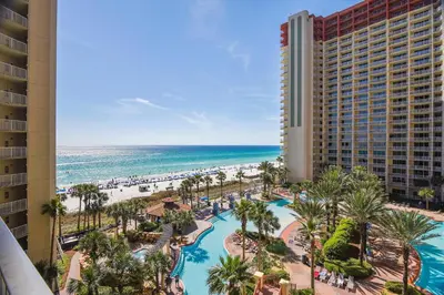 a view of the pool and beach at the resort at Shores of Panama #624 by Book That Condo in Panama City Beach