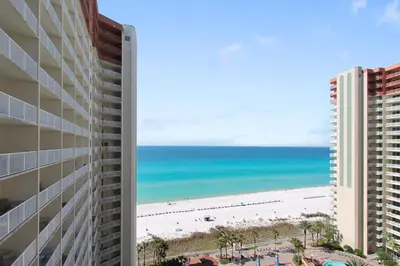 a view of the beach from the balcony of a building at Shores of Panama #1421 by Book That Condo in Panama City Beach