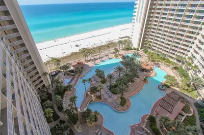 a view of the beach from the balcony of a resort at Shores of Panama #1421 by Book That Condo in Panama City Beach