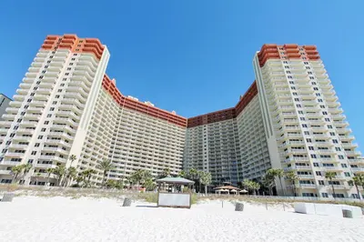 two large buildings on the beach with a beach at Shores of Panama #1531 by Book That Condo in Panama City Beach