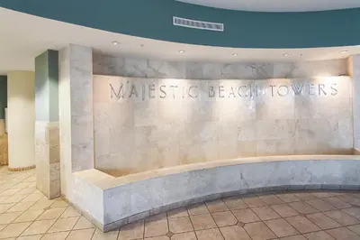 a sign for the masterchef beaumonts building at Majestic Beach Resort #1502-1 by Book That Condo in Panama City Beach