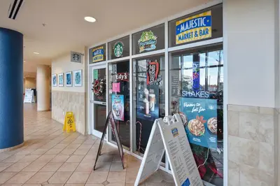 a fast food restaurant with a sign in front of it at Majestic Beach Resort #1502-1 by Book That Condo in Panama City Beach