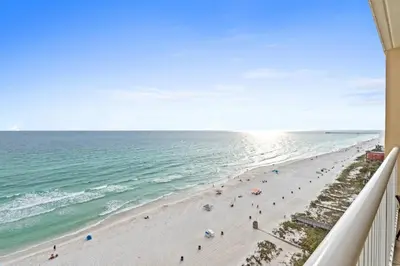 a view of the beach from the balcony of a condo at Majestic Beach Resort #1307-1 by Book That Condo in Panama City Beach