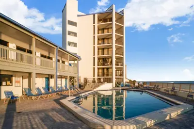 a swimming pool in front of a hotel at Aquavista Condominiums #206-W by Book That Condo in Panama City Beach