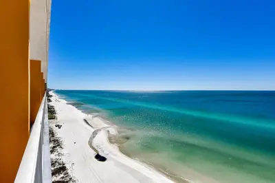 a view of the ocean from a balcony at Splash Beach Resort #1503-E by Book That Condo in Panama City Beach