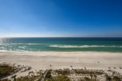 an aerial view of a beach with the ocean at Boardwalk Beach Resort #803 by Book That Condo in Panama City Beach
