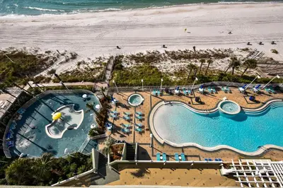 an overhead view of a pool and the beach at Boardwalk Beach Resort #803 by Book That Condo in Panama City Beach