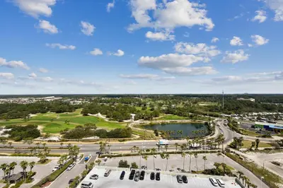 an aerial view of a city with a lake at Boardwalk Beach Resort #1605 by Book That Condo in Panama City Beach