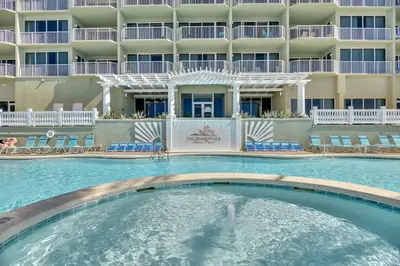 a swimming pool in front of a hotel at Boardwalk Beach Resort #1703 by Book That Condo in Panama City Beach