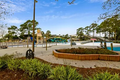 a park with a pool and a playground at Calypso Resort and Towers #602-E by Book That Condo in Panama City Beach