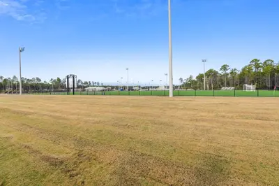 an empty baseball field with a soccer goal at Calypso Resort and Towers #602-E by Book That Condo in Panama City Beach