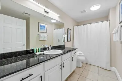 a bathroom with a sink and a toilet at Calypso Resort and Towers #801-W by Book That Condo in Panama City Beach