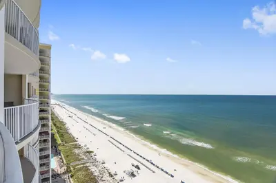 a view of the beach from the balcony of a condo at Ocean Villa Condos #1801 by Book That Condo in Panama City Beach