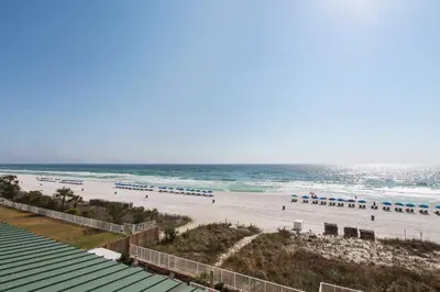 a view of a beach with people in the water at Twin Palms Resort #404 by Book That Condo in Panama City Beach