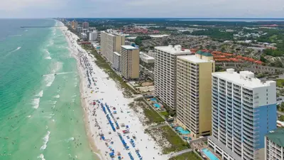 an aerial view of a beach with buildings and the ocean at Twin Palms Resort #601 by Book That Condo in Panama City Beach