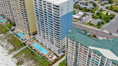 an overhead view of a large apartment building with a pool at Twin Palms Resort #601 by Book That Condo in Panama City Beach