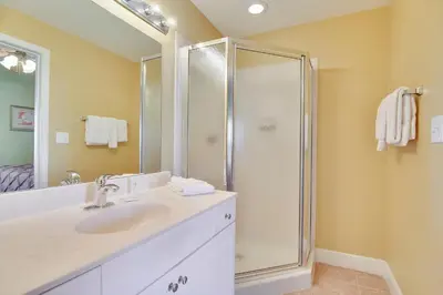 a bathroom with a sink and a shower at Tidewater Beach Resort #2014 by Book That Condo in Panama City Beach