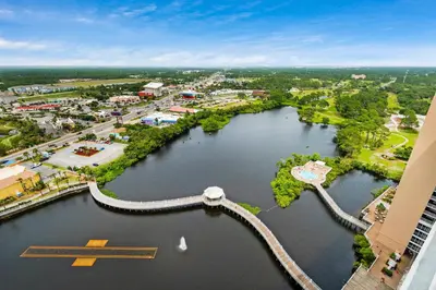 an aerial view of a city with a river at Laketown Wharf 2118 in Panama City Beach