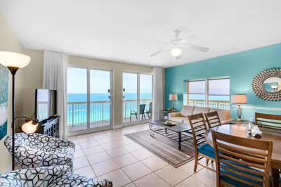 a living room with a view of the ocean at Calypso 1-1809 East in Panama City Beach