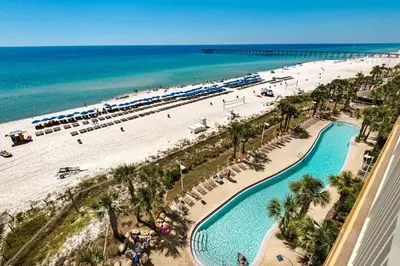 an aerial view of a beach and the ocean at Calypso 1-1809 East in Panama City Beach