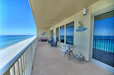 a balcony with a view of the ocean at Cozy Oceanfront Condo with Beachside Pool - Unit 1602 in Panama City Beach
