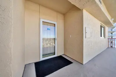 a empty room with a window in a building at Hidden Dunes 1401 in Panama City Beach