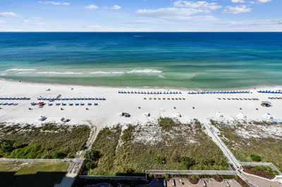 an aerial view of a beach with the ocean at Twin Palms Resort #1404 by Book That Condo in Panama City Beach